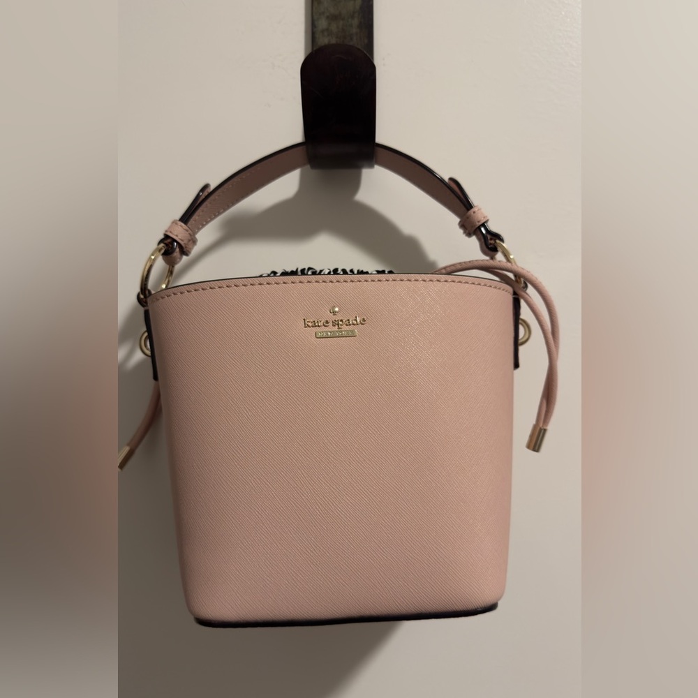 Kate Spade Pink Leather Bucket Bag With Black and White Striped Lining.  NWOT